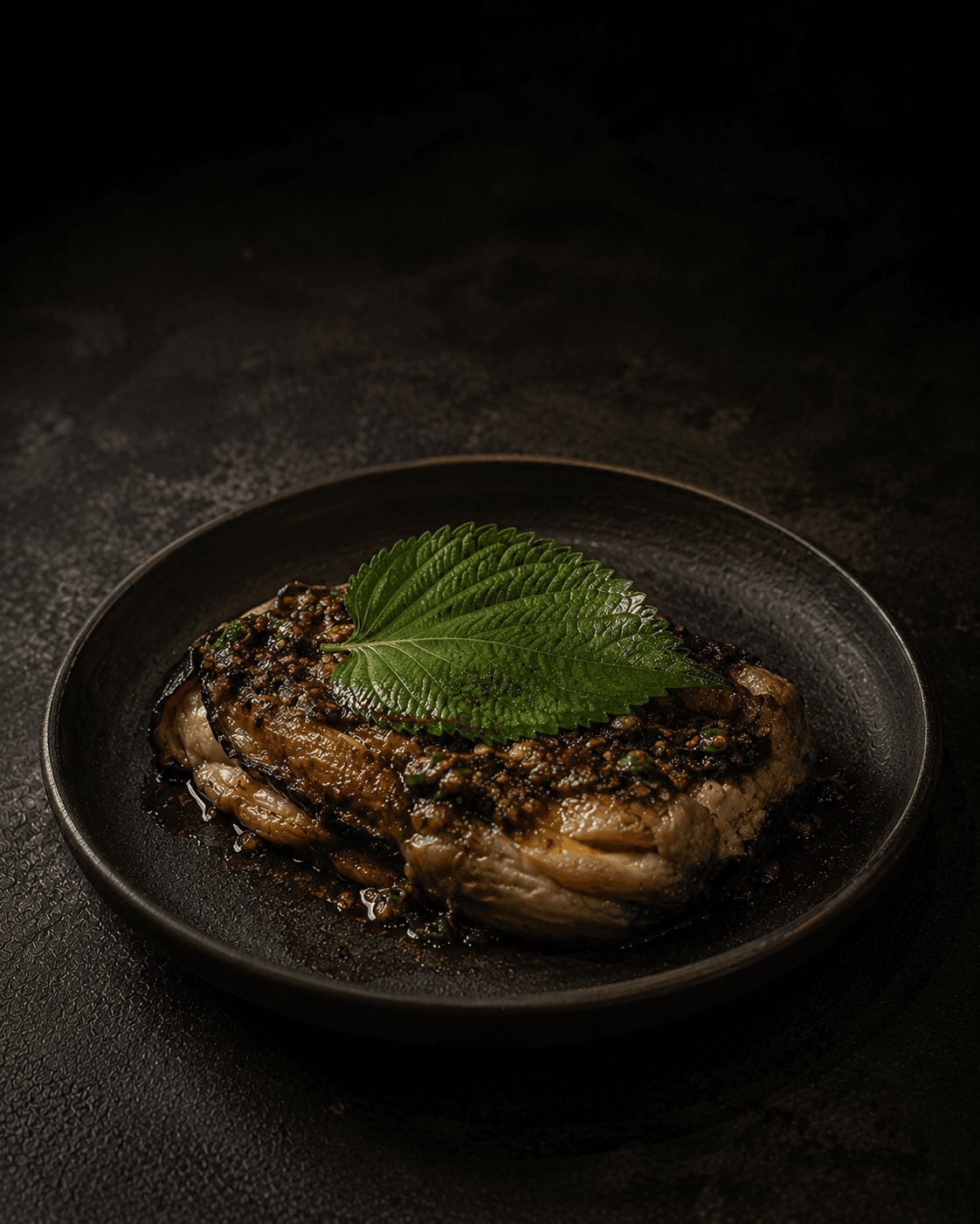 Plate of Charcoal Eggplant, Ssamjang Butter, Perilla Leaf