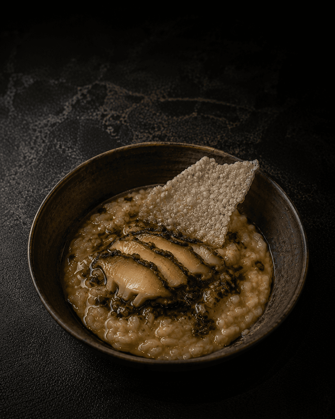 Plate of Abalone Porridge, Spring Onion Oil, Crisped Rice