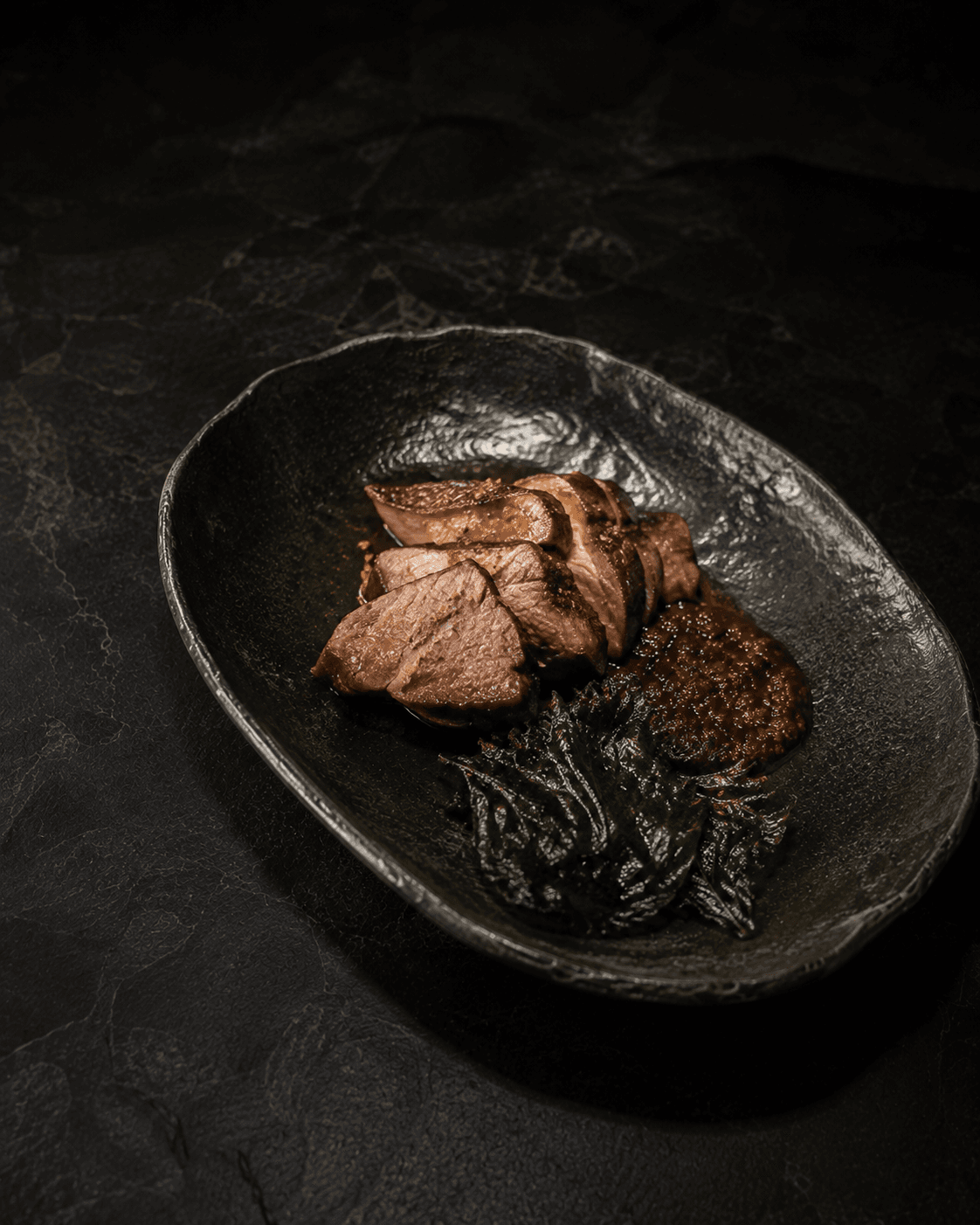 Plate of Lamb Shoulder, Doenjang Jus, Grilled Perilla